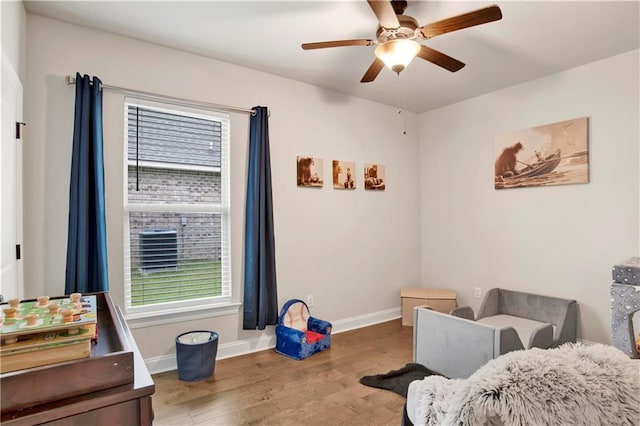 30768 Bauer Ave, Spanish Fort, AL 36527 - bedroom featuring wood finished floors, multiple windows, and a ceiling fan