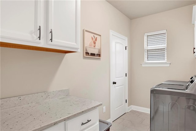 30768 Bauer Ave, Spanish Fort, AL 36527 - laundry room with washing machine and clothes dryer and cabinet space
