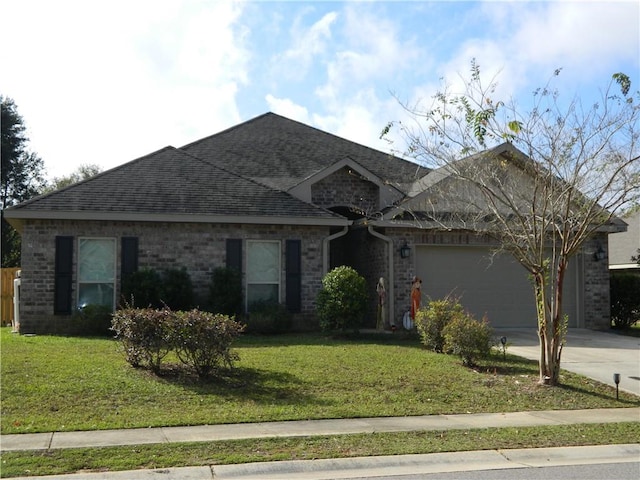 ranch-style home featuring a front yard and a garage