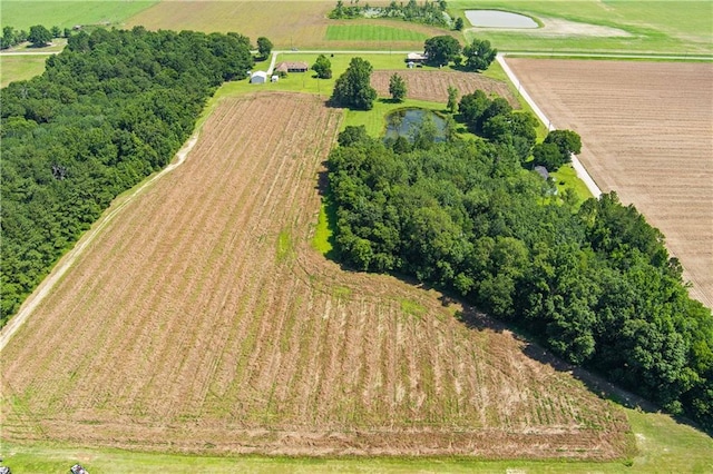 aerial view with a water view and a rural view