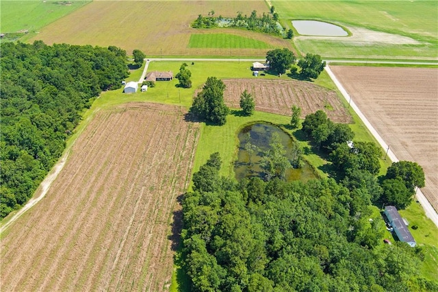 birds eye view of property featuring a rural view