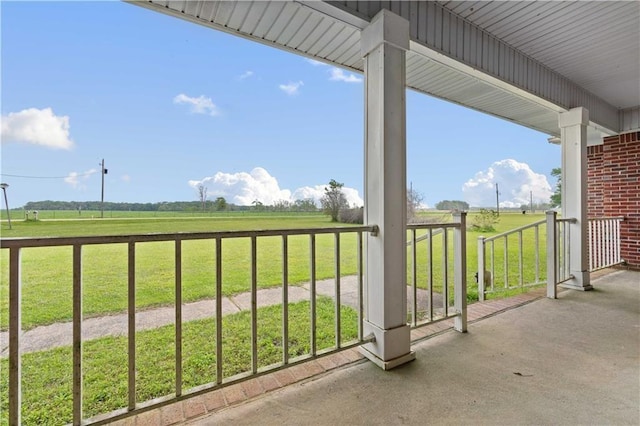 view of patio with a rural view