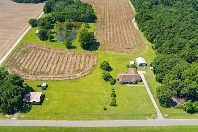 bird's eye view with a water view and a rural view