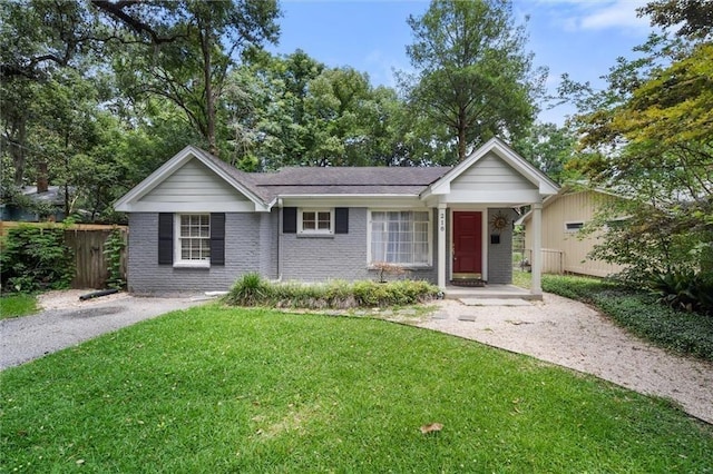 ranch-style house with a front yard