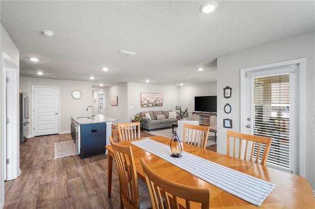 10232 Brodick Loop, Spanish Fort, AL 36527 - dining space with wood finished floors, recessed lighting, and baseboards