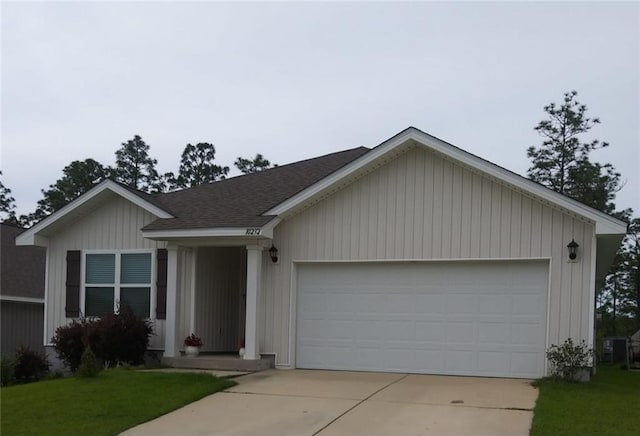 10232 Brodick Loop, Spanish Fort, AL 36527 - ranch-style home featuring concrete driveway, a shingled roof, a garage, a front yard, and central air condition unit