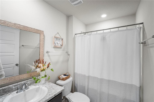 10232 Brodick Loop, Spanish Fort, AL 36527 - bathroom featuring vanity, toilet, a shower with shower curtain, and a textured ceiling