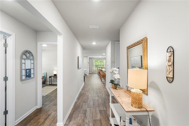 10232 Brodick Loop, Spanish Fort, AL 36527 - hallway with wood finished floors and baseboards