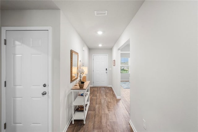 10232 Brodick Loop, Spanish Fort, AL 36527 - doorway to outside featuring wood finished floors, baseboards, and recessed lighting