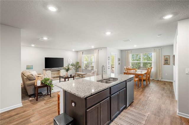 10232 Brodick Loop, Spanish Fort, AL 36527 - kitchen featuring a sink, dishwasher, light wood-type flooring, healthy amount of natural light, and recessed lighting