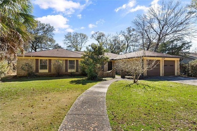 single story home featuring a garage, brick siding, driveway, and a front lawn