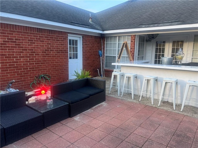 view of patio / terrace with an outdoor bar