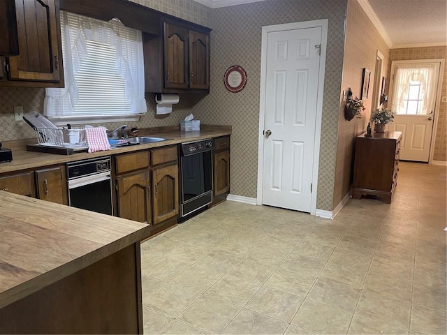 kitchen with dishwasher, ornamental molding, and wallpapered walls