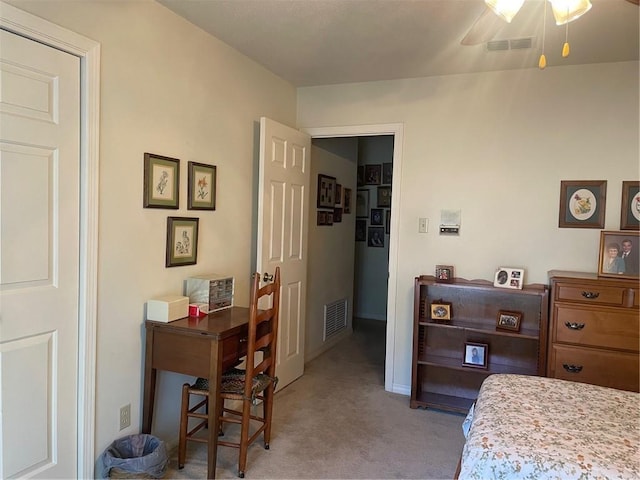 bedroom featuring carpet and visible vents