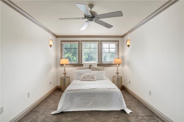 bedroom with crown molding, ceiling fan, and carpet flooring