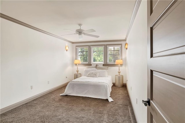 carpeted bedroom featuring ceiling fan and crown molding