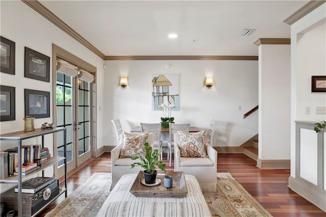 interior space with wood-type flooring and ornamental molding