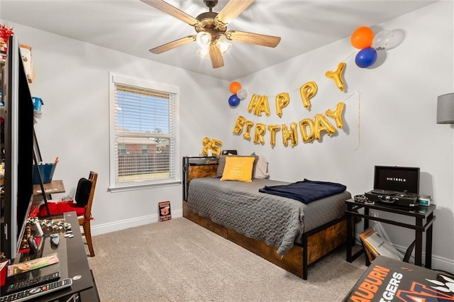 bedroom featuring carpet, baseboards, and ceiling fan