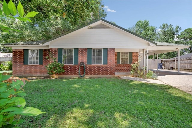 7072 Forest Glenn Ct, Irvington, AL 36544 - view of front of property with brick siding, a carport, and driveway