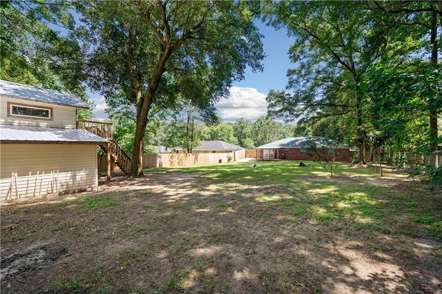 7072 Forest Glenn Ct, Irvington, AL 36544 - view of yard featuring stairway and a wooden deck
