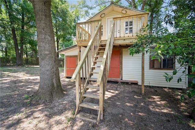 7072 Forest Glenn Ct, Irvington, AL 36544 - back of house featuring stairs and a deck
