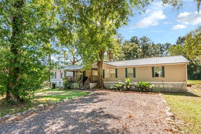 view of front of home with a front yard