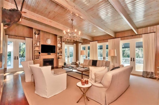 living room with french doors, hardwood / wood-style floors, wood walls, and wood ceiling