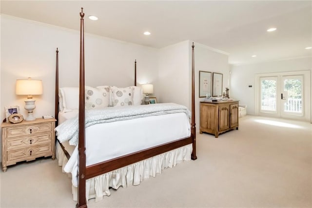 carpeted bedroom with ornamental molding