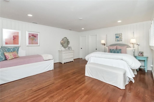 bedroom featuring dark wood-type flooring