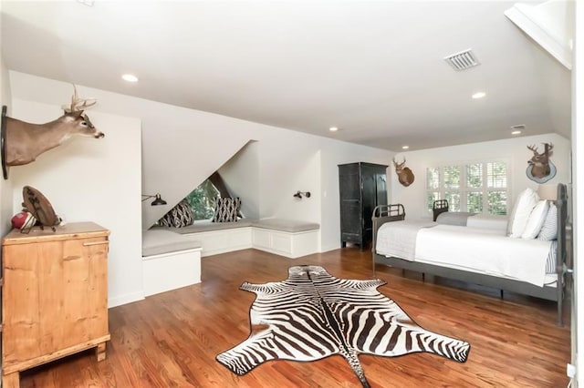 bedroom with wood-type flooring