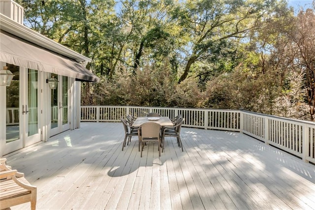 wooden terrace featuring french doors