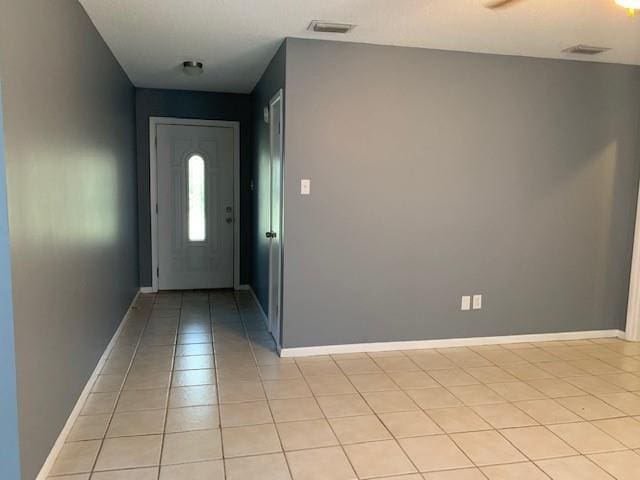 view of tiled entrance foyer