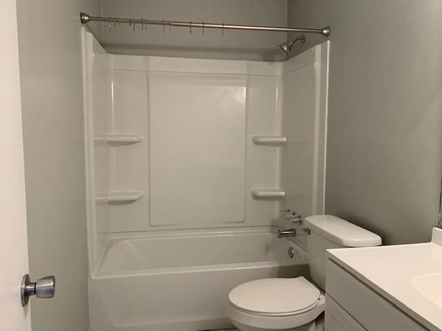 full bathroom featuring shower / washtub combination, vanity, and toilet