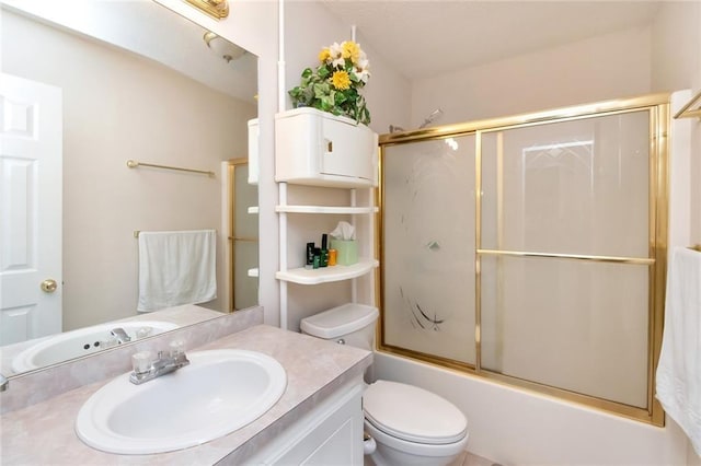 full bathroom with combined bath / shower with glass door, vanity, and toilet