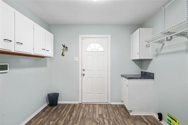 laundry room featuring dark hardwood / wood-style floors