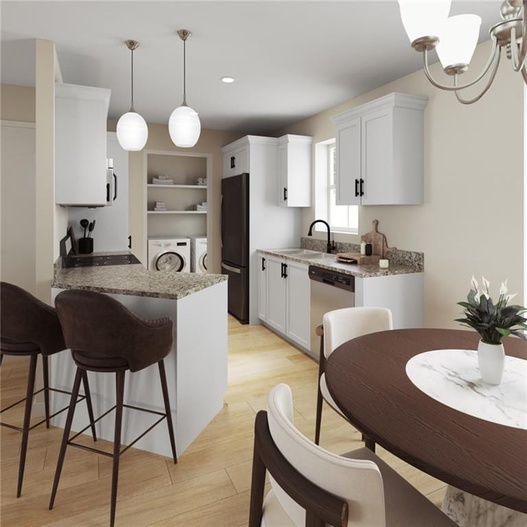 kitchen with light wood-type flooring, pendant lighting, a notable chandelier, dishwasher, and white cabinetry