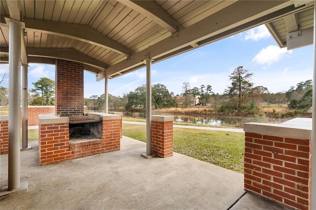 view of patio featuring a water view