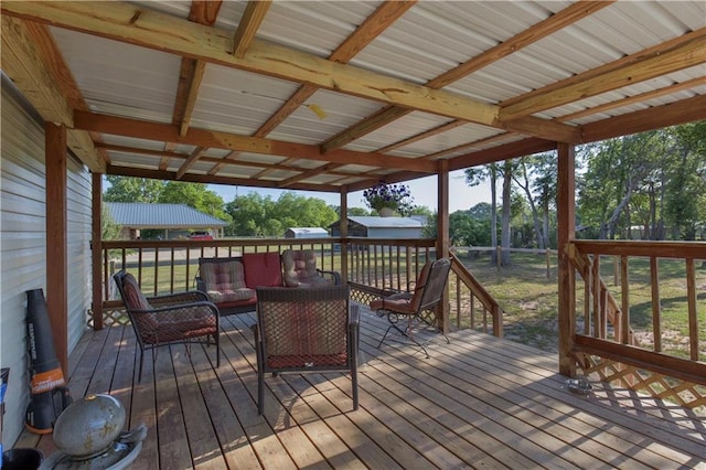 wooden deck with an outdoor hangout area