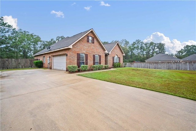 front facade with a front lawn and a garage