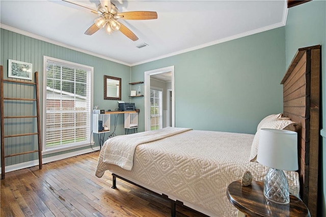 19565 4th St N, Citronelle, AL 36522 - bedroom featuring ornamental molding, hardwood / wood-style floors, and ceiling fan