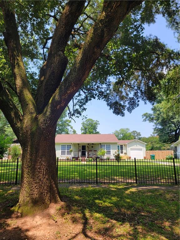 19565 4th St N, Citronelle, AL 36522 - view of yard with a garage