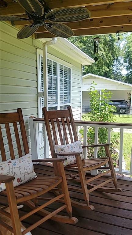 19565 4th St N, Citronelle, AL 36522 - wooden porch with a ceiling fan
