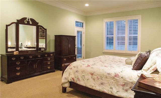 carpeted bedroom with crown molding