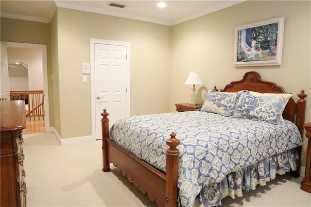 carpeted bedroom with crown molding