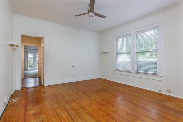 1660 Laurel St, Mobile, AL 36604 - spare room featuring crown molding, wood finished floors, ceiling fan, and baseboards