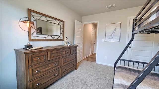 8614 Brooklyn Ct, Semmes, AL 36575 - bedroom with light colored carpet, visible vents, and baseboards