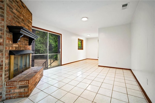 754 Pinemont Dr, Mobile, AL 36609 - unfurnished living room featuring a fireplace, baseboards, and light tile patterned flooring