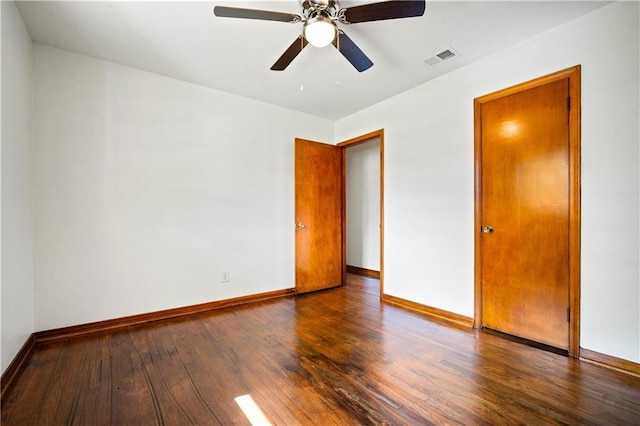 754 Pinemont Dr, Mobile, AL 36609 - unfurnished bedroom featuring wood-type flooring, baseboards, and a ceiling fan