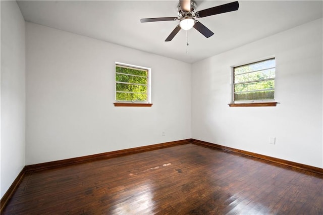 754 Pinemont Dr, Mobile, AL 36609 - empty room featuring healthy amount of natural light, baseboards, and wood finished floors