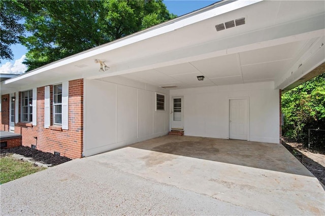 754 Pinemont Dr, Mobile, AL 36609 - view of front facade with brick siding, a carport, and driveway